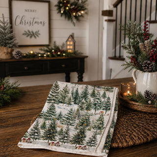 holiday kitchen towel styled neutral rustic kitchen
christmas towel displayed on cutting board winter trees
kitchen towel styled minimal holiday decor forest