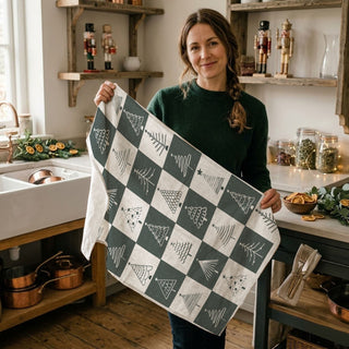 grid christmas tree kitchen towel minimalist design
checkerboard christmas tree dish towel neutral tones
modern christmas kitchen towel with multiple tree styles
neutral christmas towel with simple tree illustrations
minimalist holiday kitchen towel soft grey christmas decor