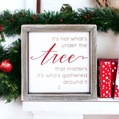 It's not what's under the tree that matters it's who's gathered around it sign