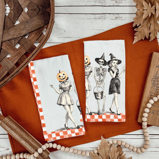 nostalgic halloween kitchen towel with classic skeleton trio
orange gingham spooky season towel for retro fall décor
mid century vintage halloween towel with genie style witch
classic halloween ladies towel with pumpkin head and wand