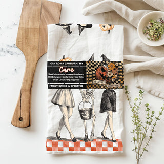 vintage halloween kitchen towel with pumpkin head woman skeleton and witch
retro halloween dish towel with orange checkered border and ghouls
pumpkin head lady skeleton and witch vintage tea towel
classic halloween pin up witch towel for fall kitchen décor