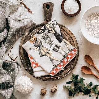 i dream of genie style vintage halloween witch towel
orange gingham halloween kitchen décor towel with ghouls
retro 1950s halloween towel with pumpkin lady and skeleton