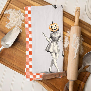 retro fall dish towel with orange checkered trim and ghouls
vintage halloween pinup witch and skeleton cotton towel
unique vintage halloween gift towel for kitchen décor lovers
farmhouse halloween towel with retro pumpkin witch design