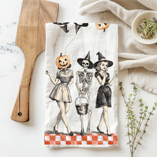 vintage inspired pumpkin and witch towel for rustic kitchen
classic black and orange halloween dish towel with ghouls
retro halloween character towel for bar cart styling
