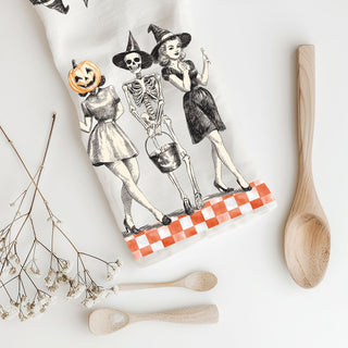 vintage style skeleton kitchen towel with pumpkin head friend
retro halloween flour sack towel with three ghoul squad girls
orange checkerboard halloween towel with vintage witch illustration
mid century style halloween dish towel pumpkin woman and skeleton