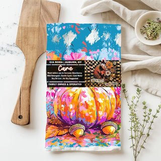 bright watercolor pumpkin kitchen towel with pink flowers
colorful hand painted fall pumpkin dish towel
vibrant autumn pumpkin flour sack towel teal background
neon pink and orange pumpkin tea towel for bold fall décor
colorful kitchen towel for fall pumpkin spice decorating
eye catching pumpkin towel for seasonal sink and stove décor