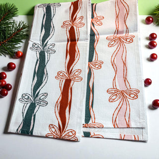 Christmas kitchen color coordination
Festive kitchen styling towel
Holiday kitchen decor styling
Christmas kitchen accent pieces