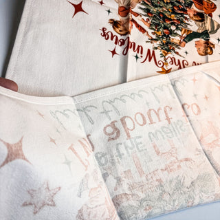 funny vintage christmas towel with kids decorating tree
retro christmas towel with humorous holiday quote
christmas kitchen towel with vintage children and tree