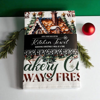 Whimsical Christmas Kitchen Decoration Ideas with gingerbread men and gingerbread house accents. 
Premium cotton gingerbread kitchen towel