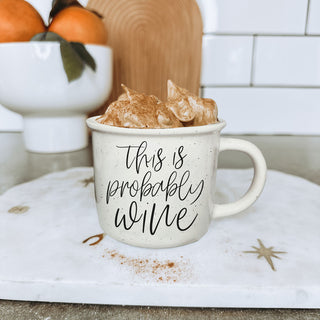 this is probably wine mug for coworker
humorous wine themed coffee mug for her
best friend gift this is probably wine cup
white speckled ceramic wine quote mug
kitchen coffee bar decor this is probably wine mug
cute neutral wine saying mug in woman’s hand