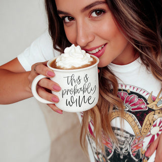 funny holiday gift mug for wine enthusiasts
this is probably wine mug for book club
sarcastic wine and coffee mug for teachers off duty
funny mug for Friday afternoon zoom calls
cheeky wine quote ceramic mug
lifestyle photo of woman with this is probably wine mug
cozy sweater and this is probably wine mug flatlay