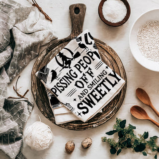 sassy witch saying towel for fall and halloween decorating
spell book and potion bottle witch towel for gothic kitchen
cheeky witch kitchen towel perfect for october gift baskets