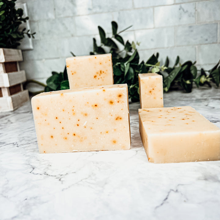 Handmade soap bars with dried carrots