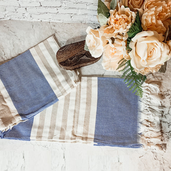 Decorative towels with tassels, blue and tan striped